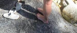 [Photo: Caroline's bare feet]