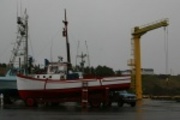 The Port of Port Orford is unique in that the boats are hosted onto rolling dry berths since the port is not well protected from storms.