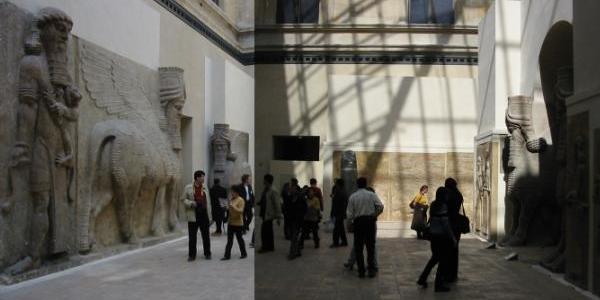 [Photo: Enclosed courtyard with Assyrian statues]