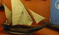 [Photo: model sailboat]