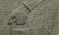 [Photo: writing on an Assyrian relief]