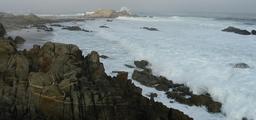 [Photo: cliffs, rocks, and waves on the Monterey coast]