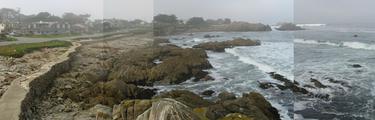 [Photo: please pardon this poorly stitched-together panorama of a seawall and rocks on the Monterey coast]