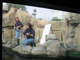 [Photo: Cecilia and Michelle feeding the otters]