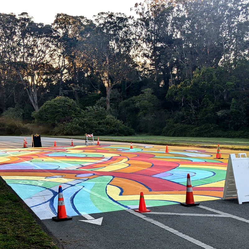 [brightly-painted road, JFK Drive]