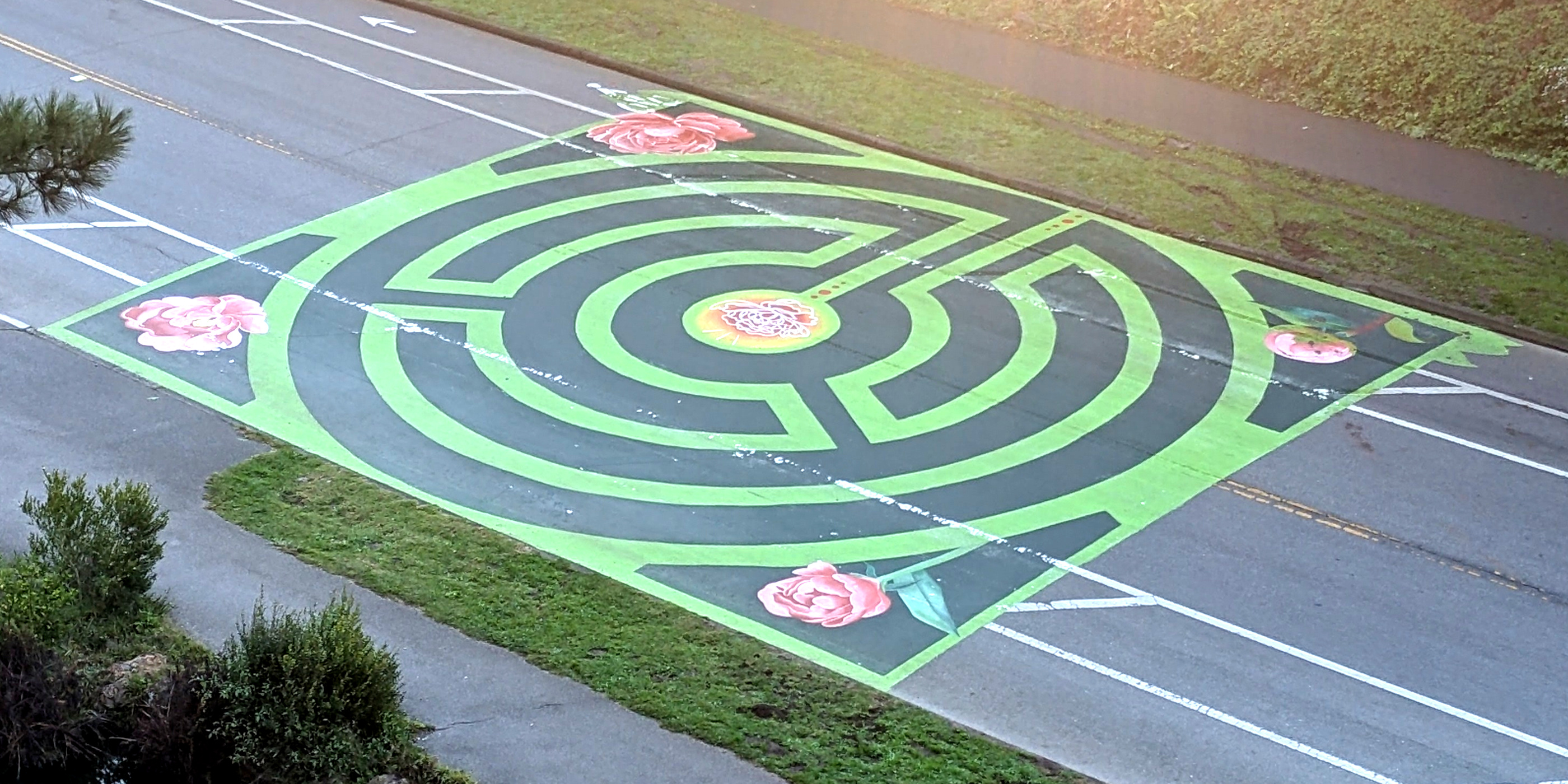 [photo of road mural Laberinto Verde: floreciendo, as seen from Prayer Book Cross]