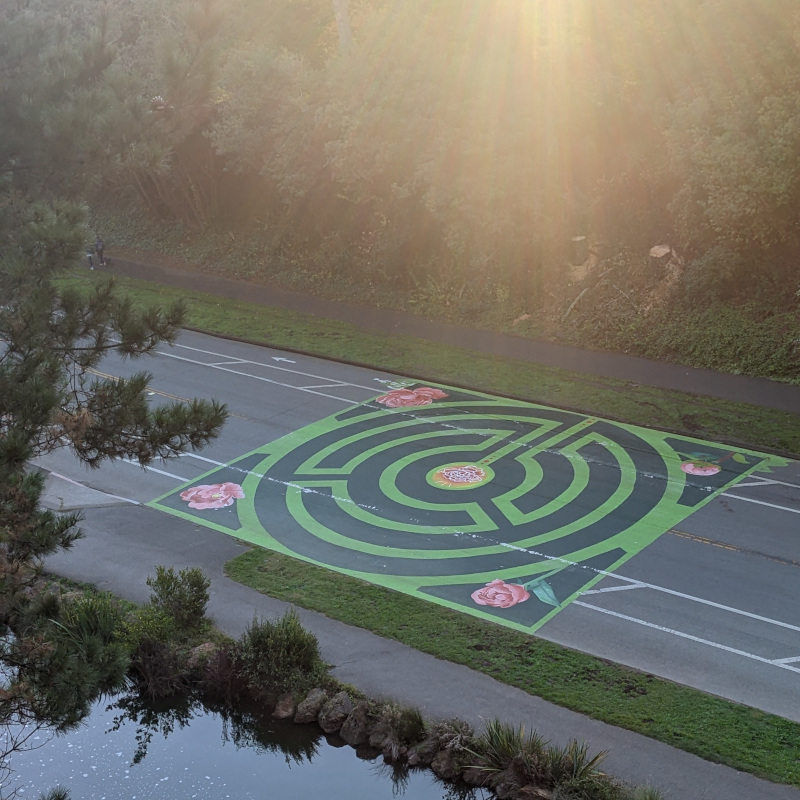 [photo of road mural Laberinto Verde: floreciendo, as seen from Prayer Book Cross]