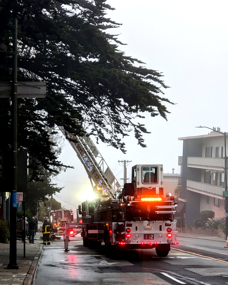 picture of fire trucks in mist