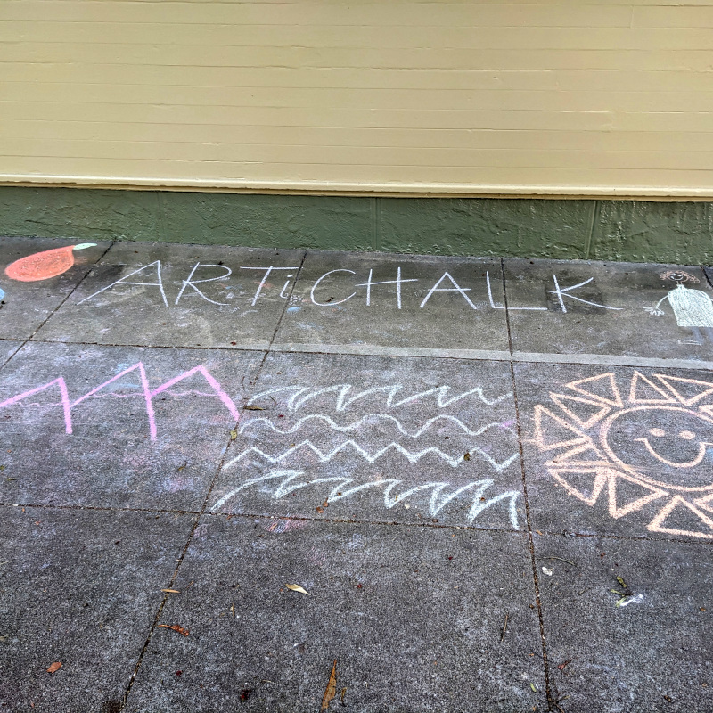 sidewalk chalk: text that says Artichalk