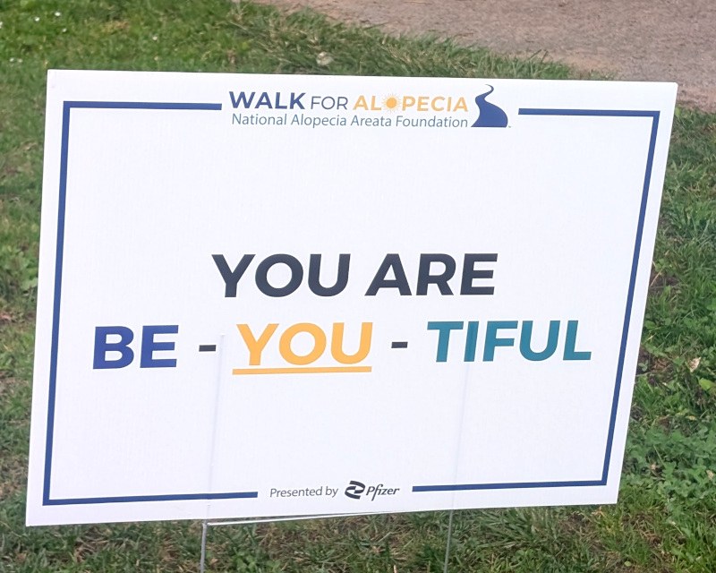 temporary sign marking the route of the National Alopecia Areata Foundation's Walk for Alopecia (Presented by Pfizer) with exhortation: You are be-you-tiful. The 'you' is underlined and yellow, arguably golden color. The 'be' is blue-gray, arguably steel-y. It doesn't look like the same gray as the beryllium picture in Wikipedia, but maybe that's an artifact of printing. Or the whole thing is a coincidence. Anyhow. The 'tiful' is teal