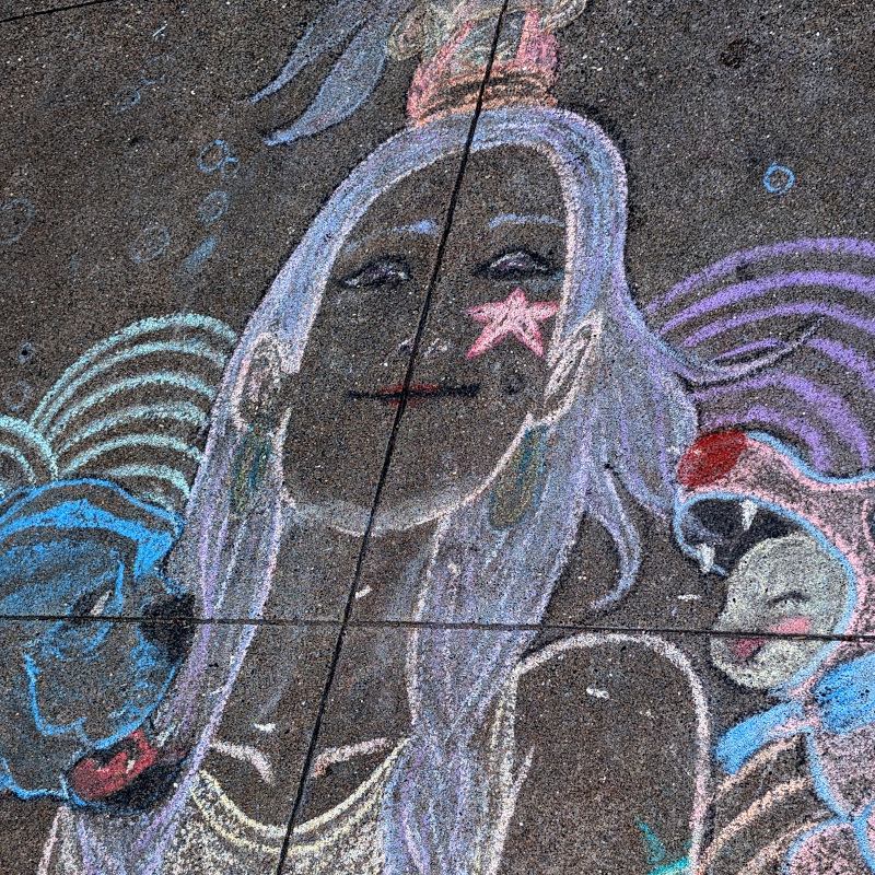 sidewalk chalk art: zooming in on the sitter's face