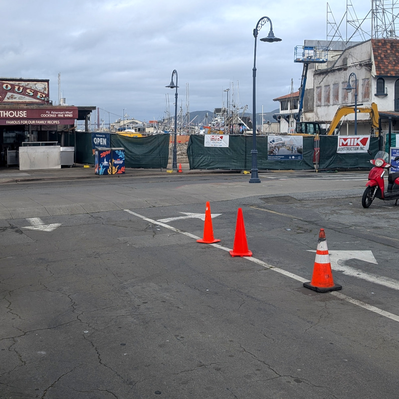 that area of crab-chowder restaurants in Fisherman's Wharf, but there's construction fencing up and a building missing