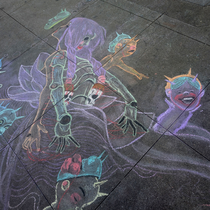 sidewalk chalk art: magical lady. she looks up at the sky, with a mask rising off of her face. but the back of her head has another face, a death's head mask, looking down. she has two arms, two human, two kinda skeleton-armor-y, reaching down