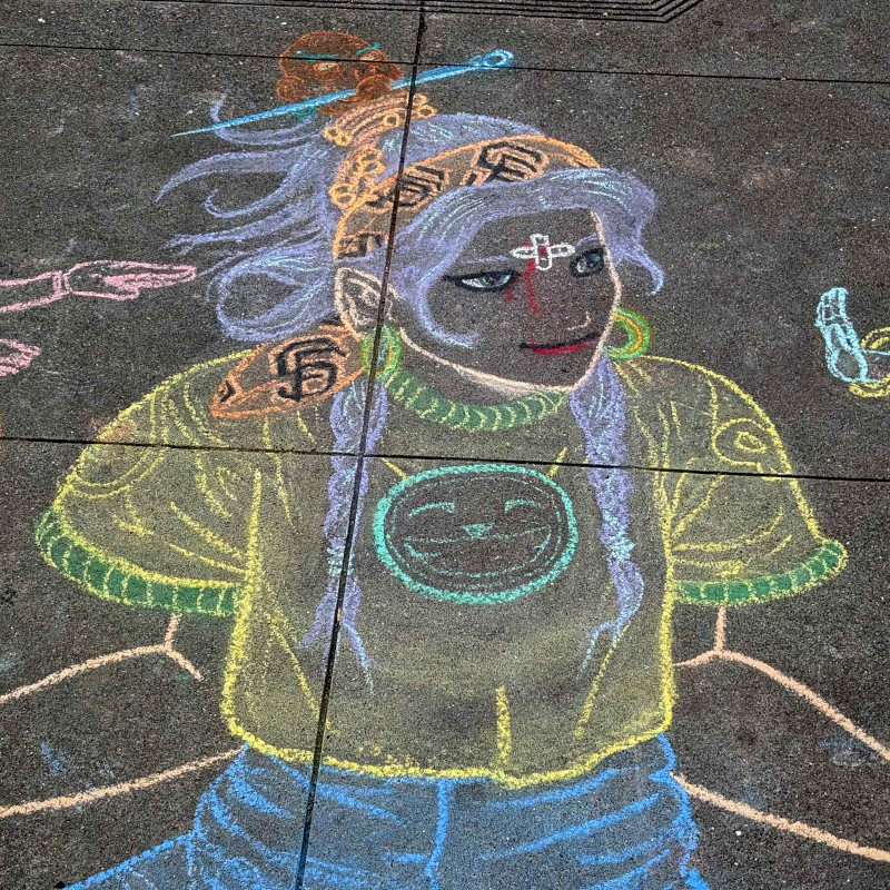 sidewalk chalk art: zooming in on the mage's head and torso. oh, the headband is an SF Giants scarf