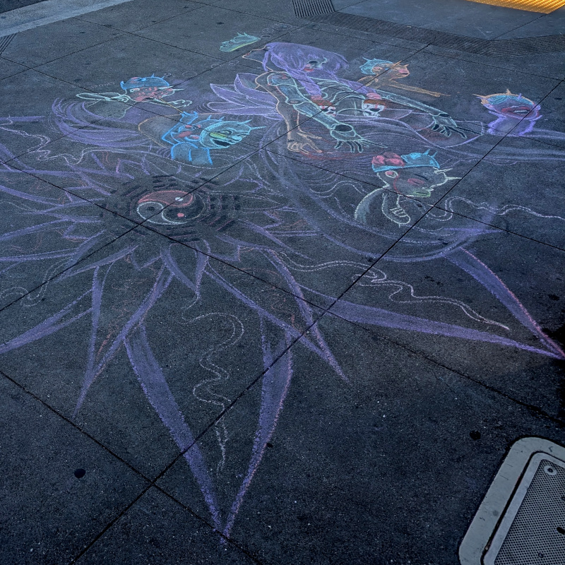 sidewalk chalk art: big purple flower with things coming out of it. a sort of lady. some imps. Daoist-adjacent symbols