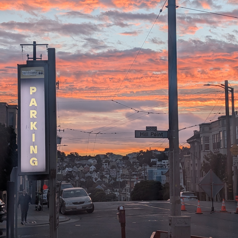 sunrise with clouds colored as if by Maxfield Parrish